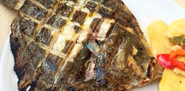 Pescado del día a la brasa